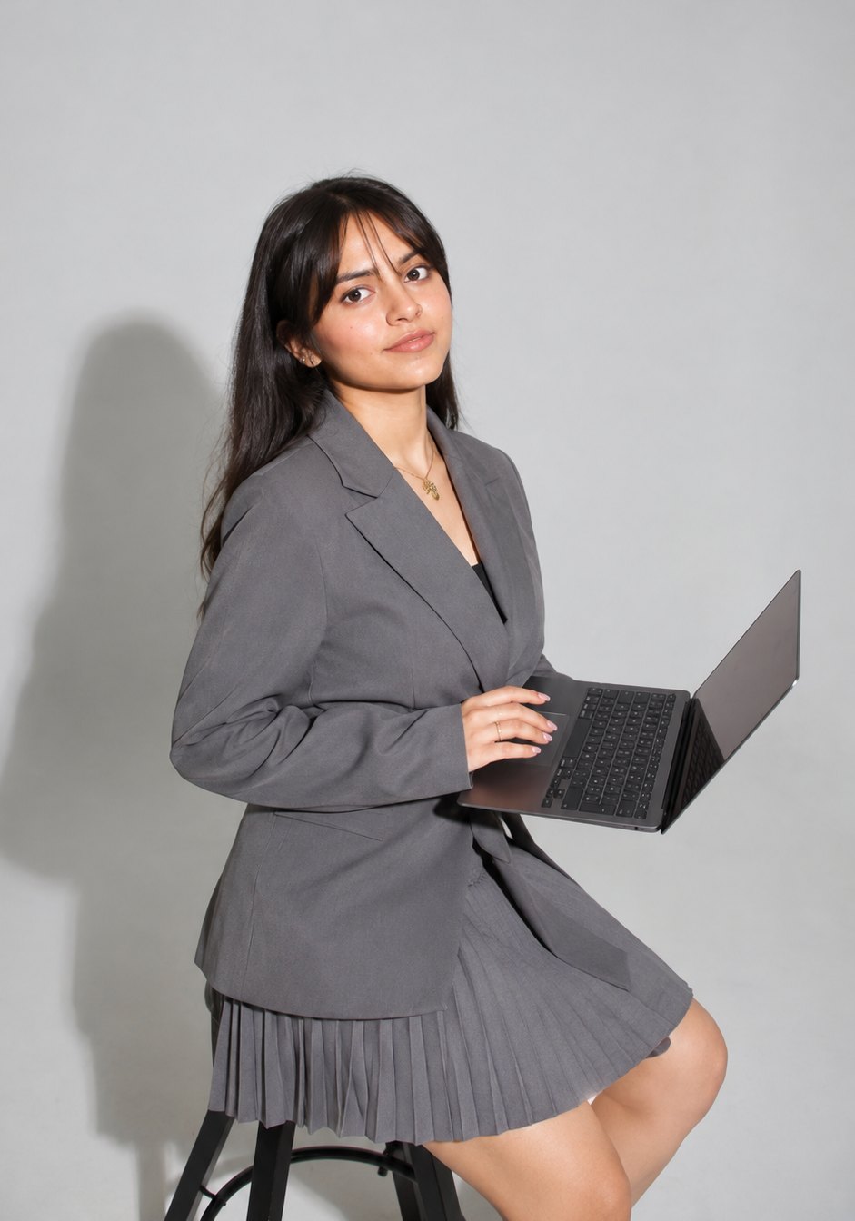 Sitting with a laptop, working through a content plan